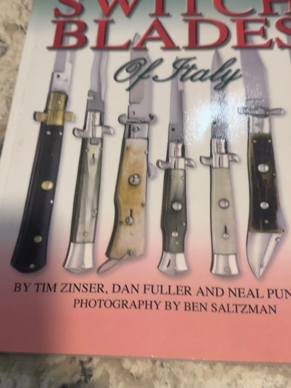 Firearms Reference Guide Book - Brown and Silver guns knive book